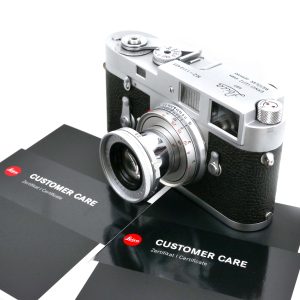 Leica M2 Gehäuse (KOOHE 10308) + Schnellladespule (14260) + Leica Elmar 2.8 / 50 mm | Clean-Cameras.ch