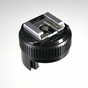 Nikon Zubehörschuh AS-4 | Clean-Cameras.ch