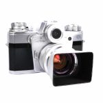 Zeiss Ikon Contarex + Carl Zeiss Planar 2/50mm (10.2401) | Clean-Cameras.ch