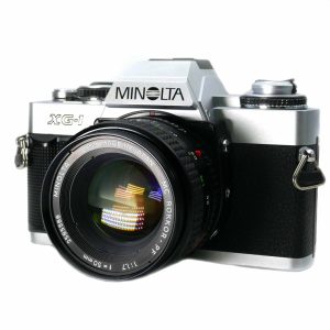 Minolta XG-1 + 50 mm + viel Zubehör